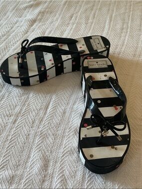 kate spade Black and White Striped Flip Flops with Polka Dot Accents